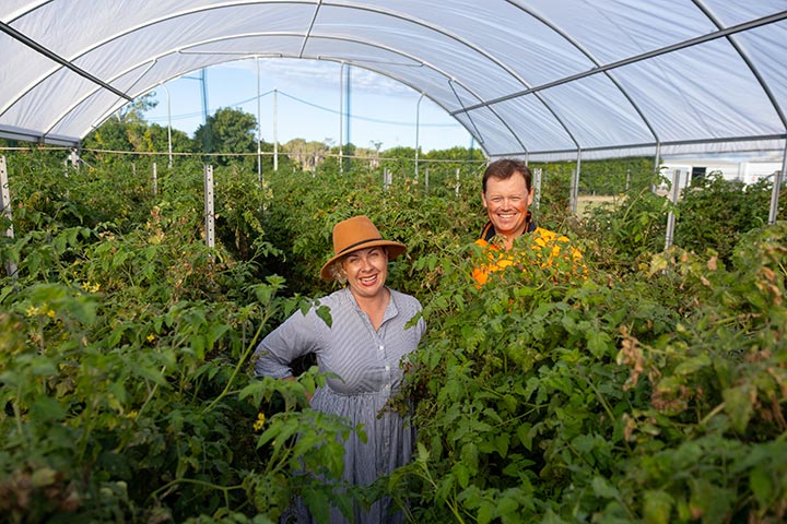 Jessica and Luke Volker in their greenhouse