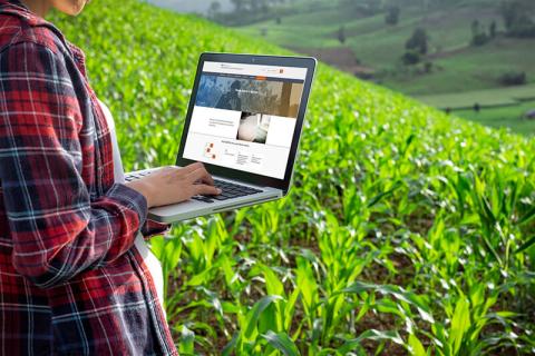 Farmer with laptop