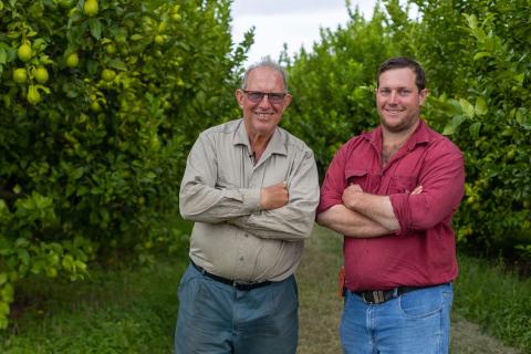 Citrus growers Oscar and Dwaine Bugno on their property near Dimbulah in North Queensland